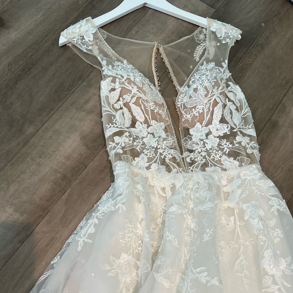 Wedding dress, never worn and never altered!!